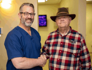 Dr. Timm and Joe sharing a handshake. Post-Operative Instructions - Onalaska, WI