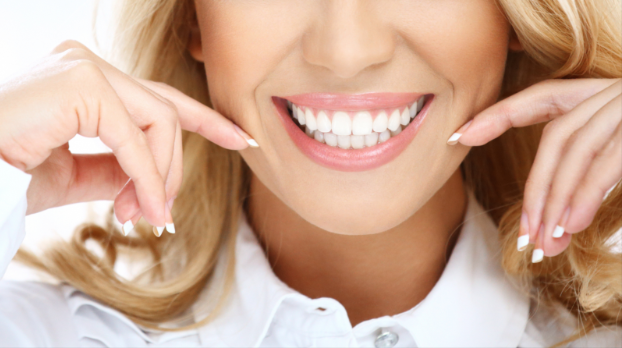 Women showing off her new smile